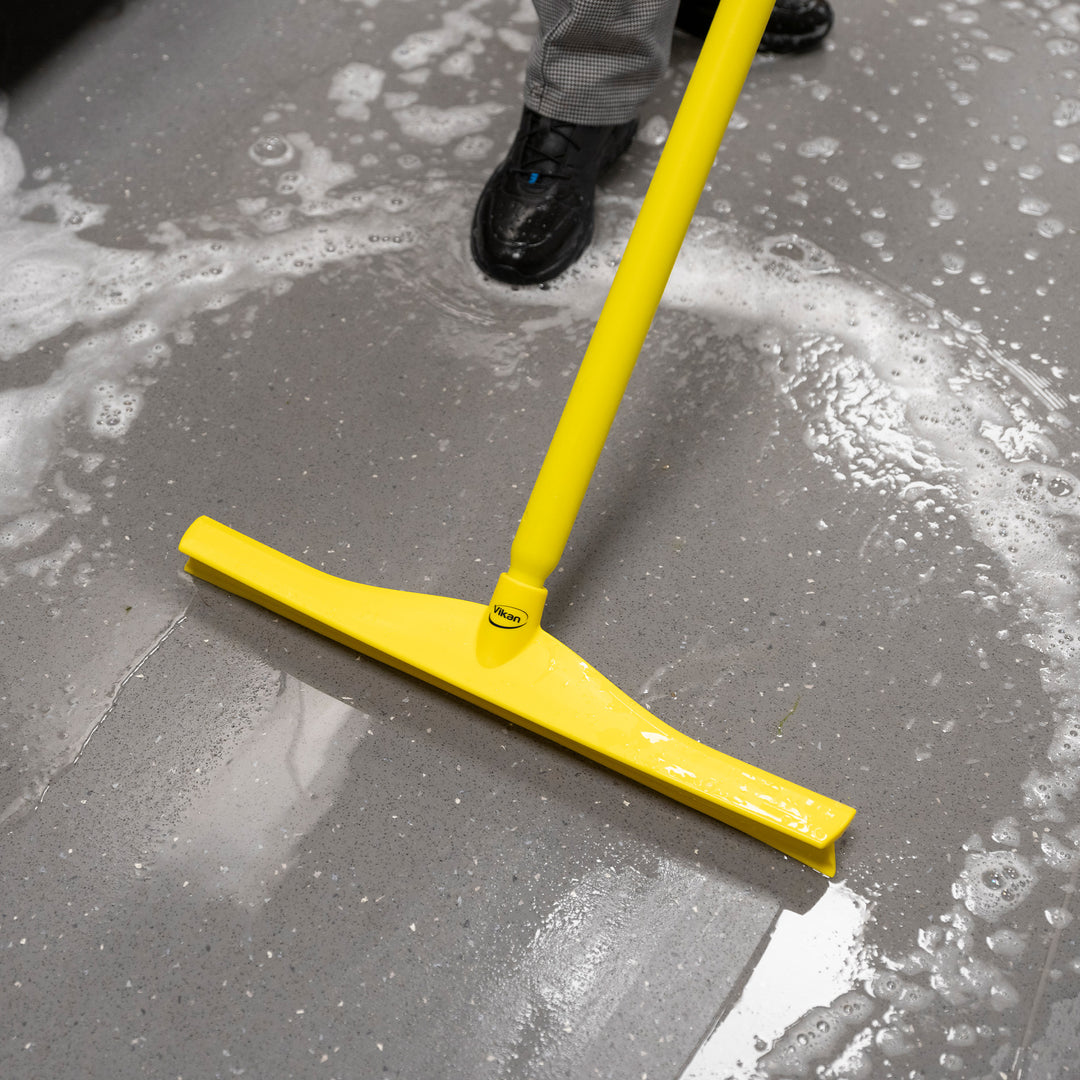 Techniclean 24" Single Blade Overmolded Squeegee (1/ea) in action yellow